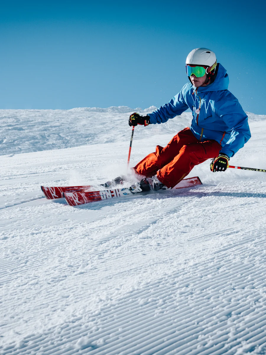 Skier carving empty groomed corduroy near Deer Valley Resort, ten minutes from The Skyfall Residence
